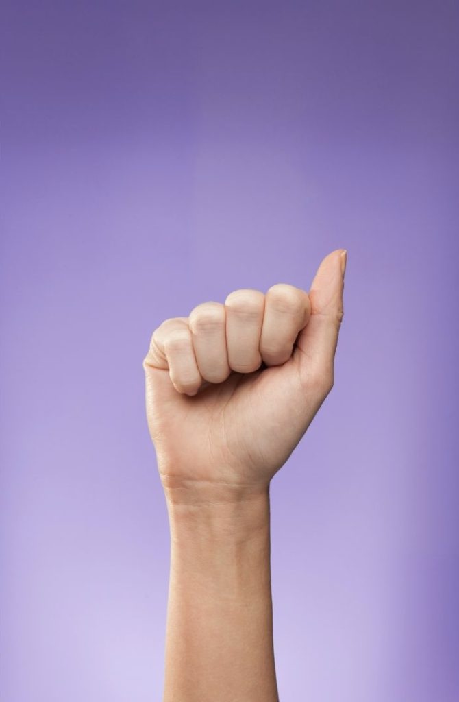 A fist showing sign language asl interpreter services